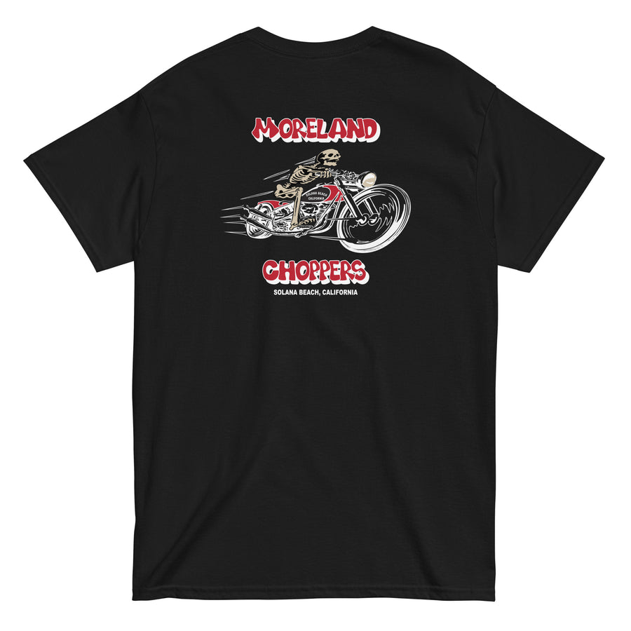 Moreland Choppers signature black t-shirt featuring a detailed design of a skeleton riding a chopper, embodying the adventurous spirit of Solana Beach's motorcycle heritage.